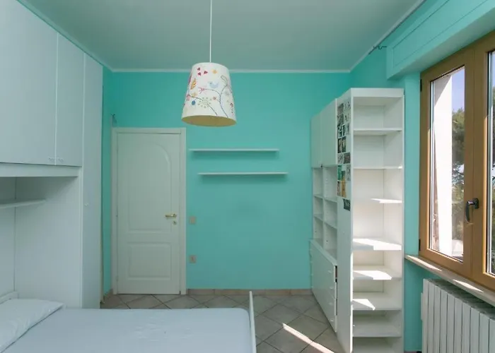 Апартаменты Trilocale Con Terrazzo Fronte Mare, - M024