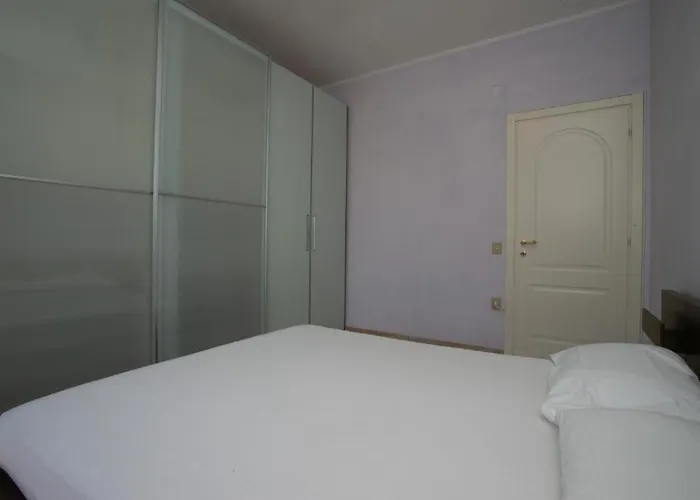 Апартаменты Trilocale Con Terrazzo Fronte Mare, - M024 *
