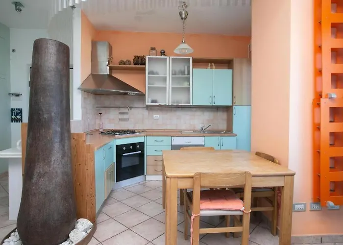 Апартаменты Trilocale Con Terrazzo Fronte Mare, - M024 *