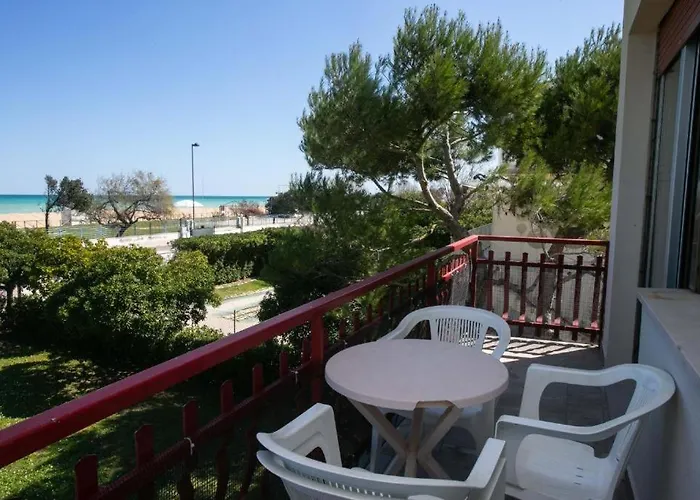 Апартаменты Trilocale Con Terrazzo Fronte Mare, - M024 *